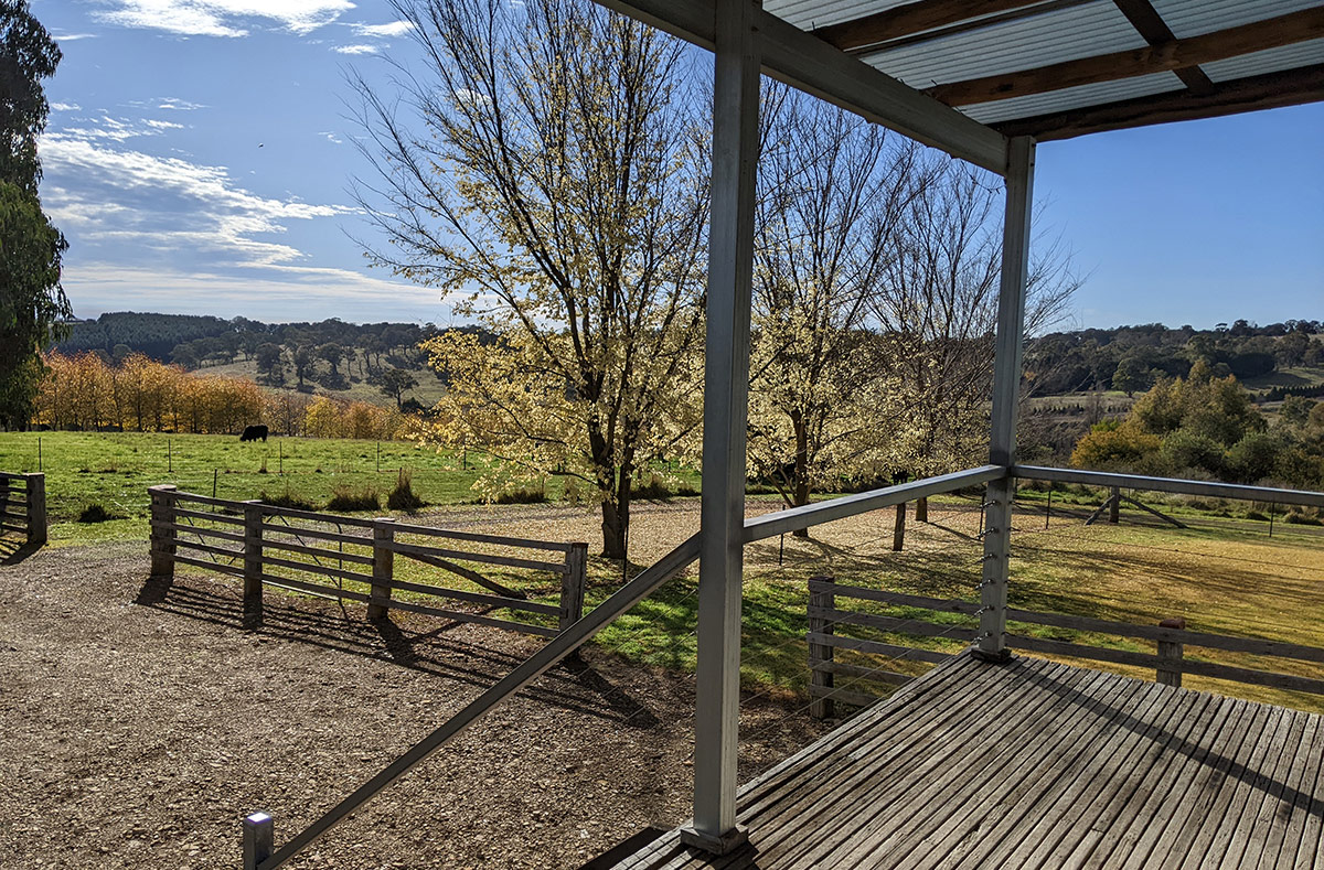 View from the rear verandah with wooded hills in the distance